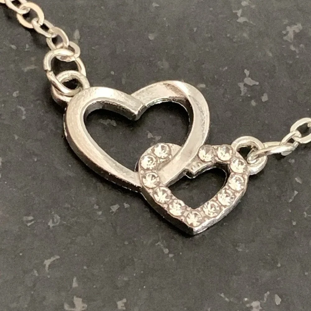 Interlocking Double Hearts Silver Tone Necklace with Rhinestones